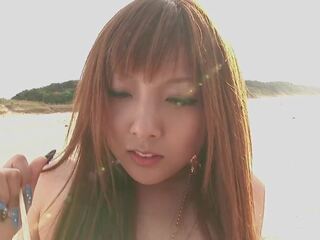Insanely upslika jepang gyaru in revealing swiimsuit engages in risky antics outdoors right by the pantai